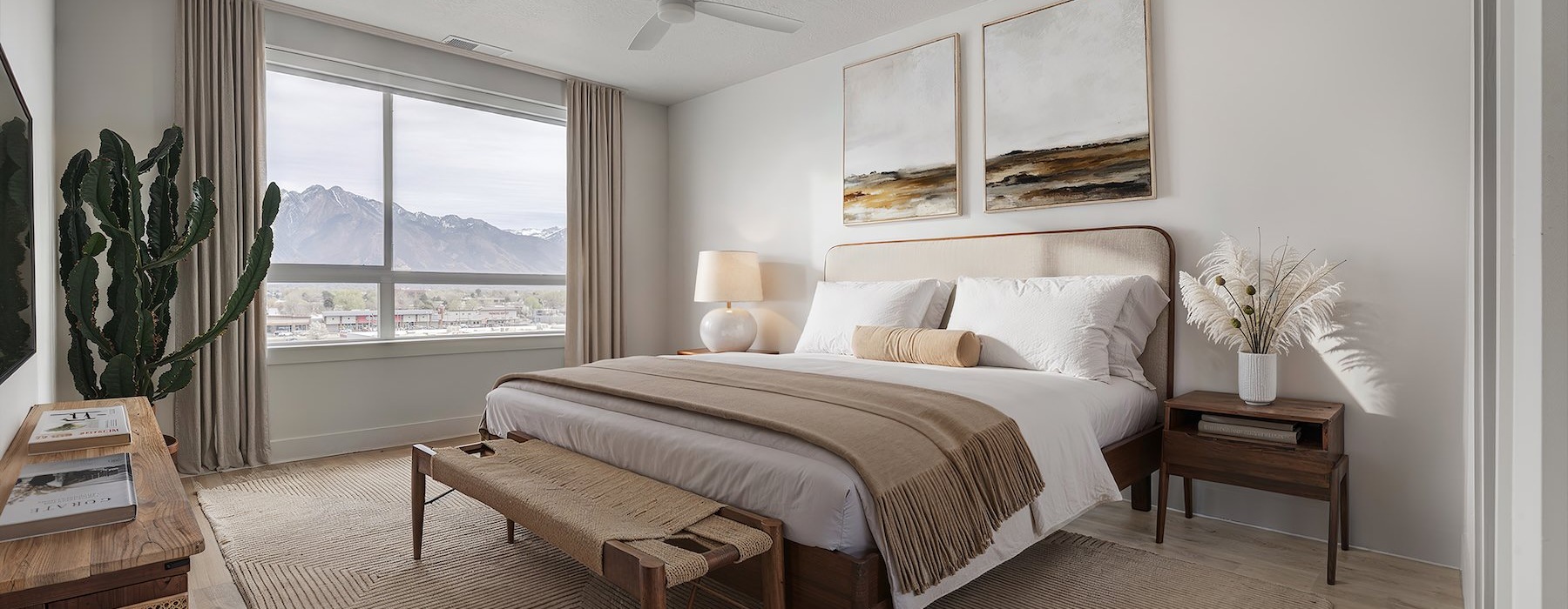 a bedroom with a bed and a table