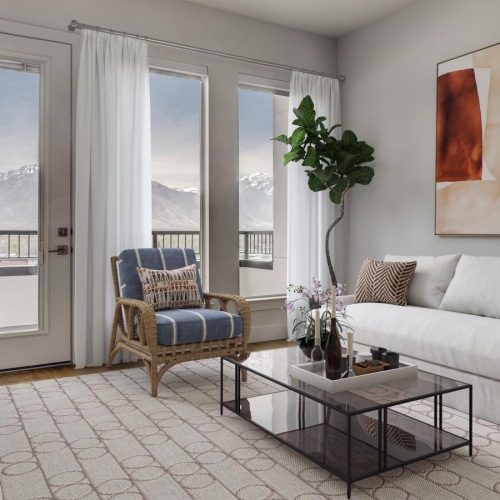 a living room with a white couch and a table